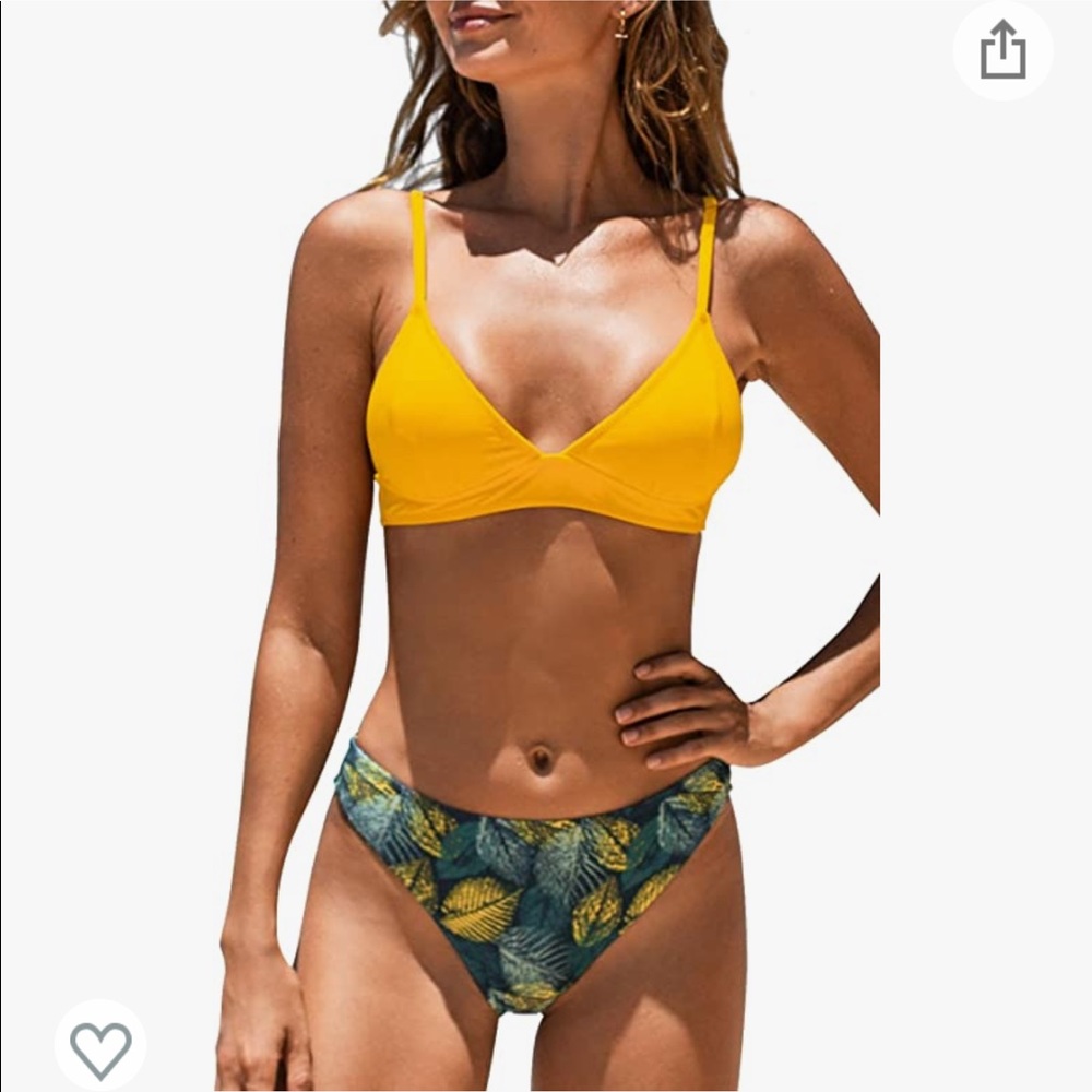 Yellow triangle top with leaf print bottom. Brand new in bag.